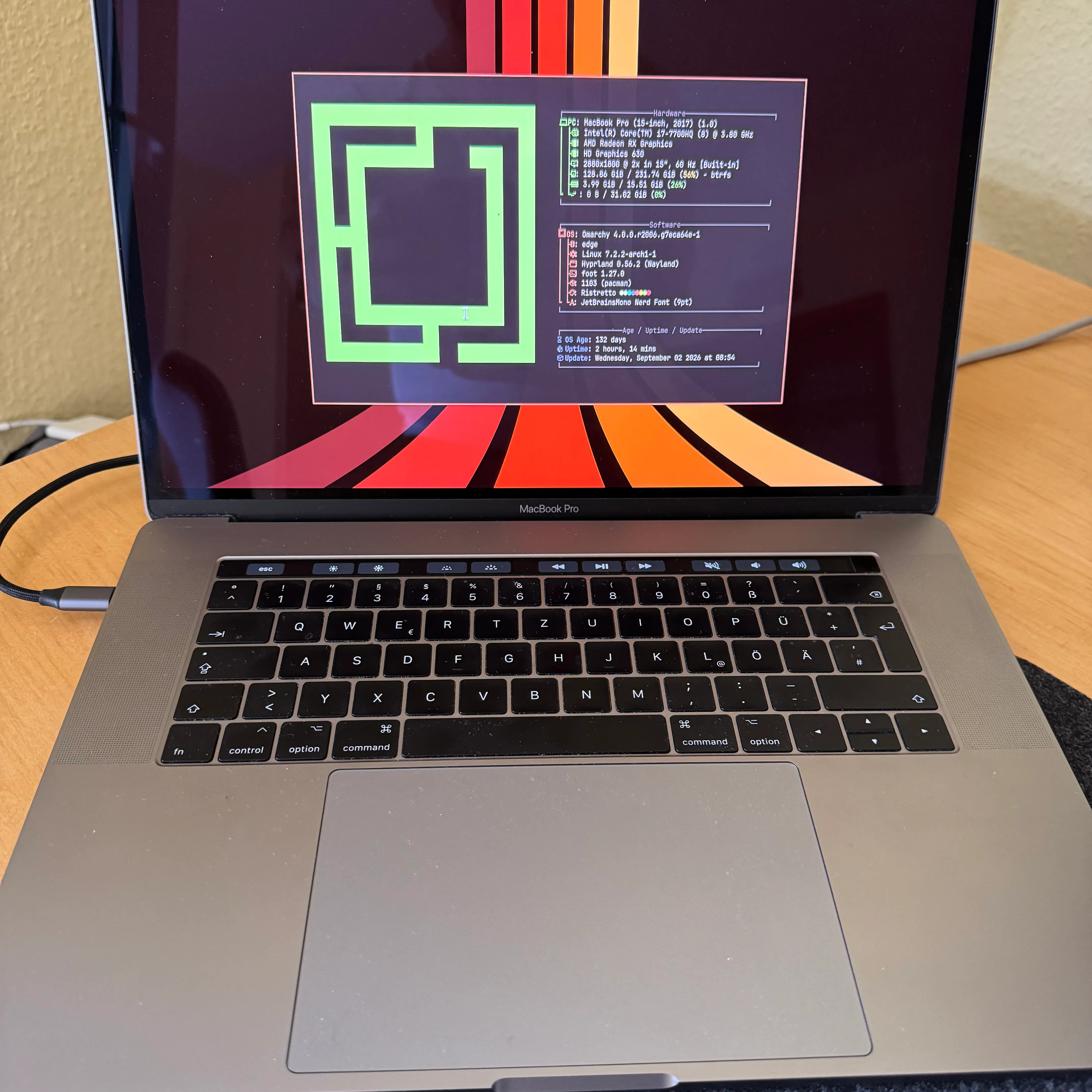 Omarchy Quattro running on old Macbook Pro 15” with T1